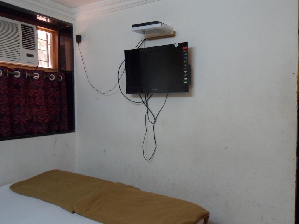 Hotel Happyland Mumbai Oda fotoğraf